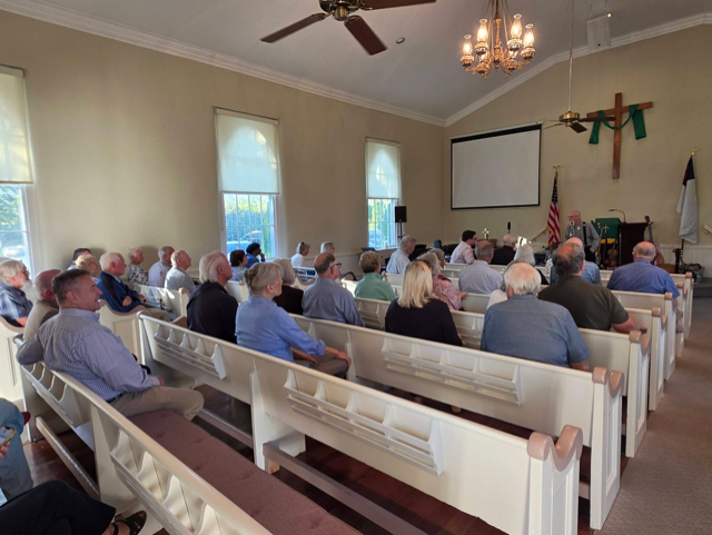 Congregation seated in pews at the BBQ & Bluegrass event at Salem Presbyterian Church
