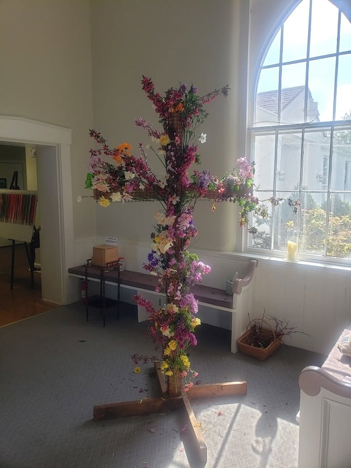 Blooming cross decorated with colorful spring flowers inside Salem Presbyterian Church