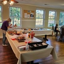 Fellowship hall potluck spread with food on tables at Salem Presbyterian Church